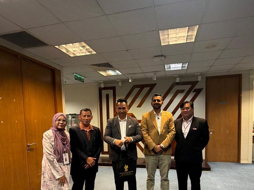 Group photo at an education event in Malaysia